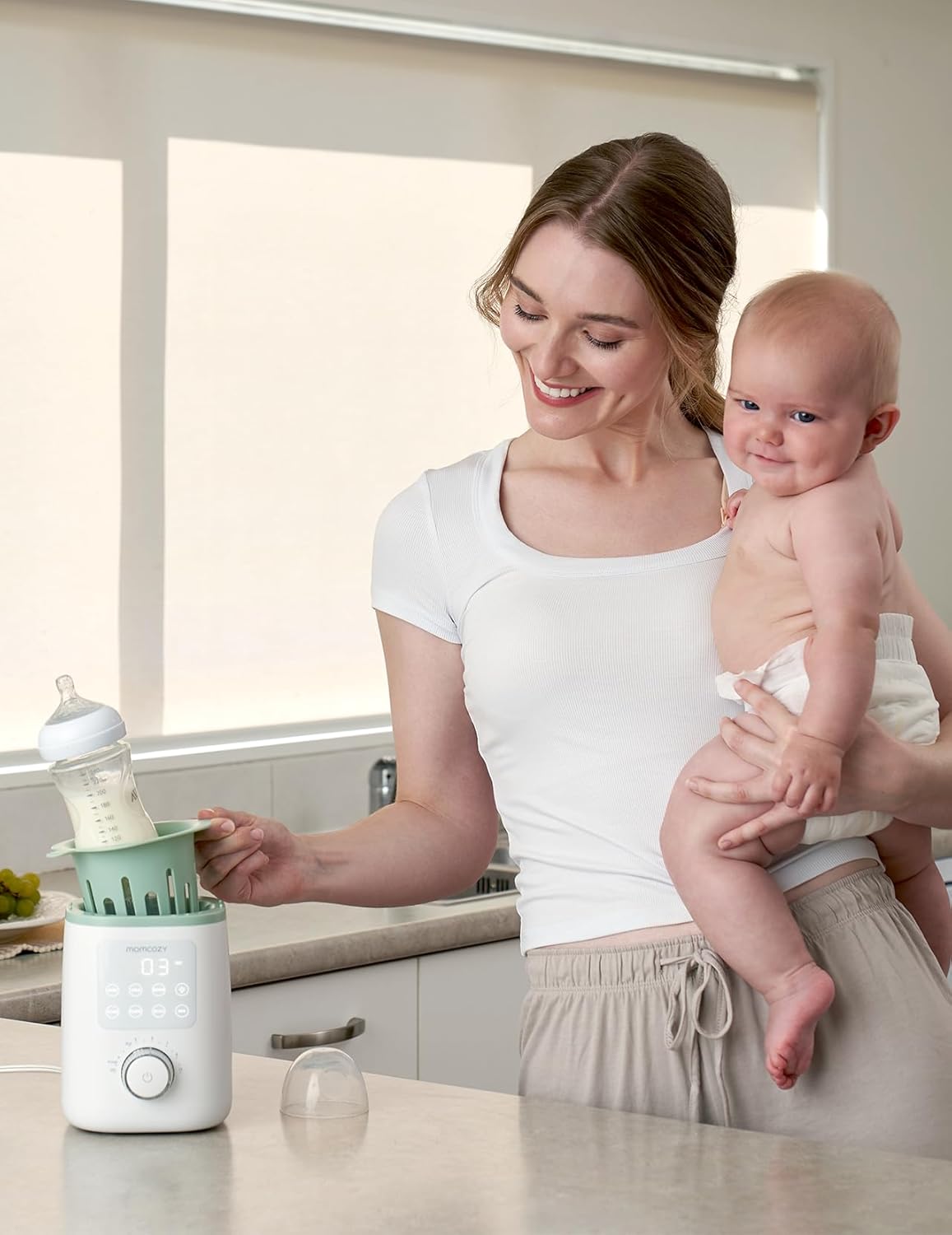 Ngrohës për shishe bebeje Momcozy MW02 Nutri Smart Analog, multifunksional, i bardhë
