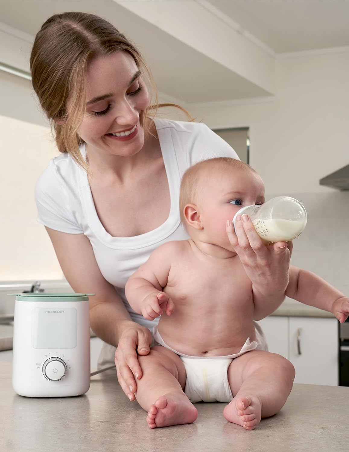 Ngrohës për shishe bebeje Momcozy MW02 Nutri Smart Analog, multifunksional, i bardhë